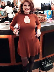 Sensual older strumpet is posing seminaked indoor